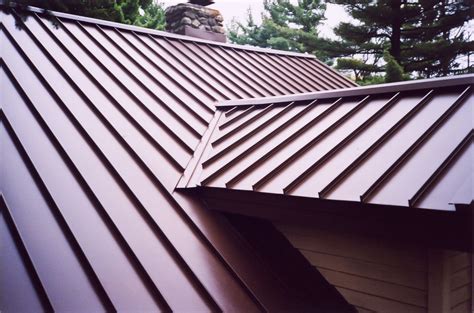 black raised seam metal siding historic house|standing seam siding installation.